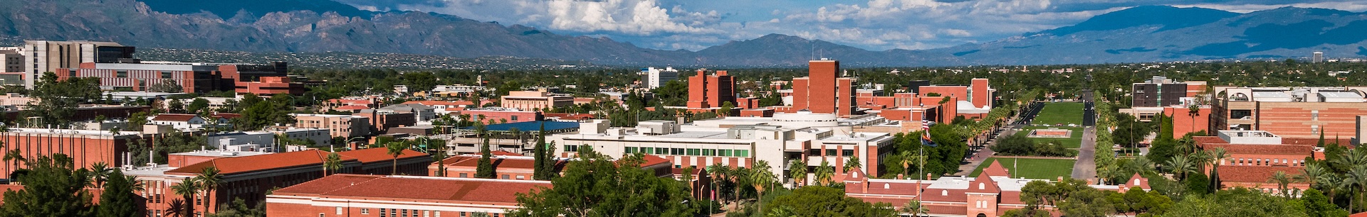 Old Main with Clouds and Mountains in the backgroup